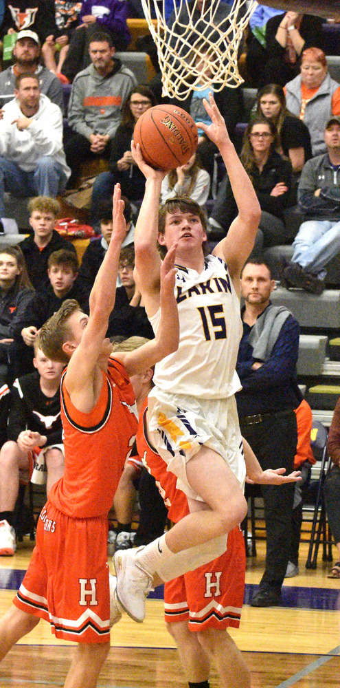 Boys end streak with loss to Holcomb