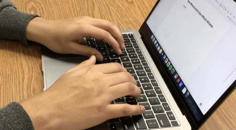 Student working on MacBook